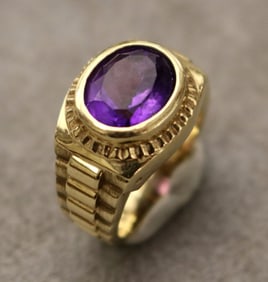 14K YELLOW GOLD AND AMETHYST RING. - Ring size: 5. Gross wt: 4 dwt.