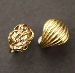 TWO 14K YELLOW GOLD DOME RINGS.
