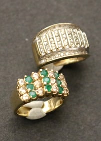 TWO YELLOW GOLD AND GEMSTONE RINGS.