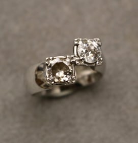 18K WHITE GOLD AND DIAMOND TWIN-STONE RING. mid-20th century.