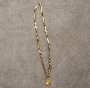 EARLY 20TH CENTURY 14K YELLOW GOLD WATCH CHAIN SUSPENDING GOLD NUGGET,