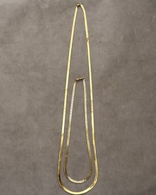 TWO 14K YELLOW GOLD FLEXIBLE STRAP NECKLACES.