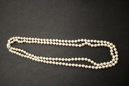 MIKIMOTO DOUBLE-STRAND CULTURED PEARL NECKLACE.