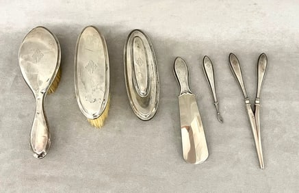 SIX-PIECE BLACK STARR & FROST CO. STERLING SILVER MOUNTED VANITY SET. early 20th century. - Hand