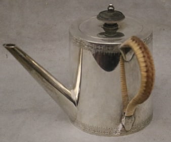 GEORGE III SILVER INDIVIDUAL COFFEE POT. Made London, 1776-7, by John Carter. - H: 4 3/4". Gross Wt: