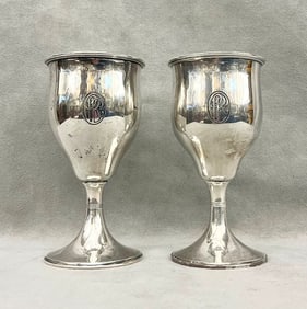 PAIR TIFFANY & CO. STERLING SILVER GOBLETS ENGRAVED AS SPORTS TROPHIES. early 20th century. - H: 6".