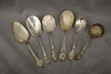 SIX ASSORTED 19TH CENTURY "MEDALLION" PATTERN SILVER SERVING UTENSILS. - Longest: 9 7/8". Wt: 14.8