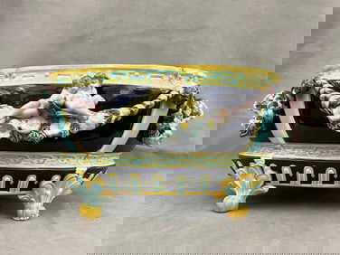 ENGLISH MAJOLICA FIGURAL-MODELED OVAL FOOTED PLANTER,19th century.