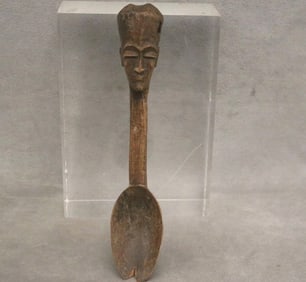 PHILIPPINE CARVED IFUGAO BULUL ANTHROPOMORPHIC WOODEN SPOON. - Height: 8 inches.