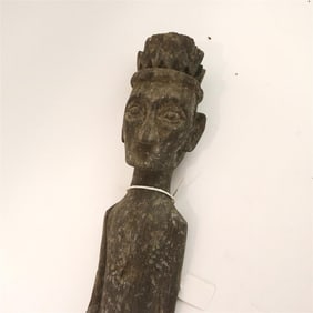 INDONESIAN KALIMANTAN DAYAK WOODEN GUARD FIGURE, Mid 20th century.