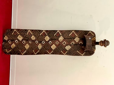 CAMEROONEAN BAMILEKE DECORATED WOODEN BED, - Length approximately: 73 inches.