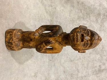 CONGOLESE YOMBE PEOPLE DIGNITARY SITTING ON A STOOL STATUE. - Height approximately: 12 inches.