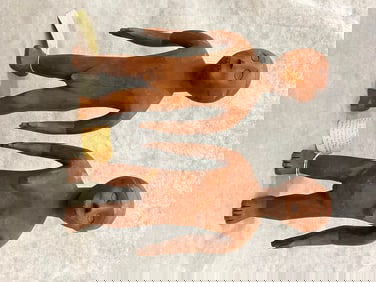 TANZANIAN MAKONDE STANDING MALE AND FEMALE FIGURINES. - Height approximately: 15 inches.