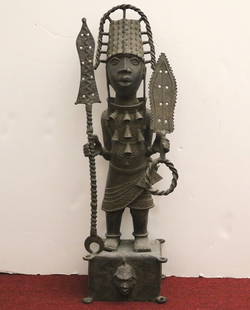 NIGERIAN BENIN WARRIOR CHIEF OBA BRONZE: NIGERIAN BENIN WARRIOR CHIEF OBA BRONZE. Impressive bronze sculpture of a Benin warrior chief which is representative of Benin art closely associated with the Oba, or King. The impressive figure is a