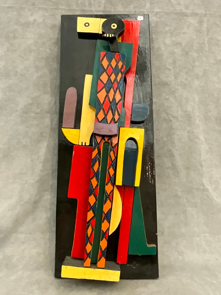 R. D. BISSETT (American, born 1938). The Harlequin, 1989, Hand carved and colored wooden board. (1 of 7)