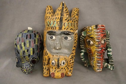 MEXICAN POLYCHROMED CARVED FESTIVAL MASKS. - Height: 12 to 17 inches.