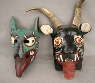 MEXICAN POLYCHROMED CARVED FESTIVAL MASKS. - Height: 14 to 20 inches.