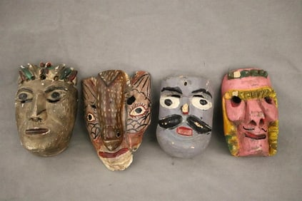 MEXICAN POLYCHROMED CARVED FESTIVAL MASKS. - Height: 8 to 11 inches.