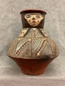 PERUVIAN SHIPIBO POTTERY EFFIGY VESSEL. - Height: 21 1/2 inches.