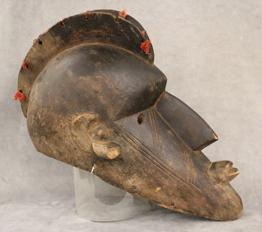 CONGOLESE LWALWA CEREMONIAL BANGONGO NKAKI MASK, - Height (approximately): 21 inches.: CONGOLESE LWALWA CEREMONIAL BANGONGO NKAKI MASK. Ceremonial bangongo mask from the Lwalwa People located in the region where the Kasai River marks the border between Zaire and Angola. The masks had an