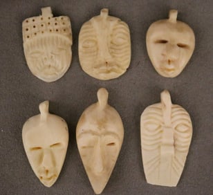 CONGOLESE SELECTION OF CARVED PENDANTS. - Height: (approx.) 2 inches.