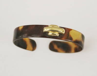 SIGNED A. CUPULLO 18K YELLOW GOLD MOUNTED FAUX TORTOISESHELL OPEN-END OVAL BANGLE BRACELET,: SIGNED A. CUPULLO 18K YELLOW GOLD MOUNTED FAUX TORTOISESHELL OPEN-END OVAL BANGLE BRACELET.