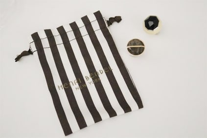 TWO CONTEMPORARY DESIGN FASHION RINGS, - Ring sizes, 6 and 7, respectively.