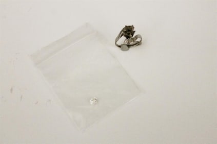 WHITE GOLD AND DIAMOND BAGUETTE CROSS-OVER DESIGN RING SETTING, AND NON-ASSOCIATED UNMOUNTED