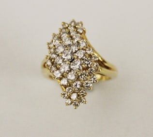 18K YELLOW GOLD AND DIAMOND CLUSTER RING, - Ring size: 6 1/4. Gross wt.: 6 dwt.