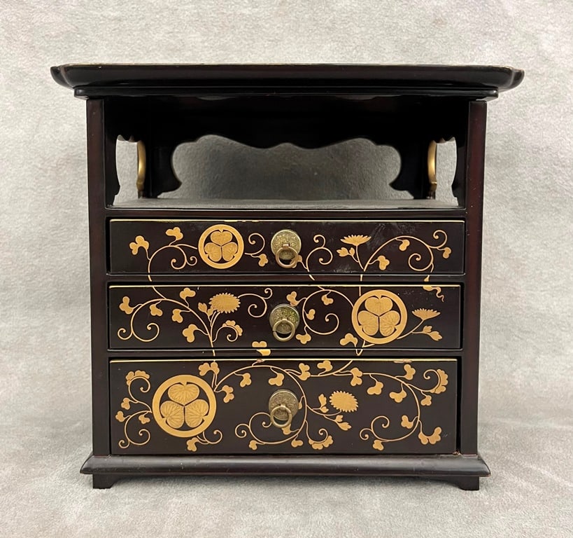 JAPANESE GILT-ON-BLACK LACQUER MINIATURE THREE-DRAWER CHEST, early-to-mid 20th century. - H: 6 in.; (1 of 16)