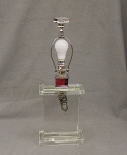 CONTEMPORARY CRYSTAL BLOCK TABLE LAMP. - H: 23 3/4 in., overall.: CONTEMPORARY CRYSTAL BLOCK TABLE LAMP.  Rectangular panel raised on stepped rectangular base; crystal block finial. - H: 23 3/4 in., overall.