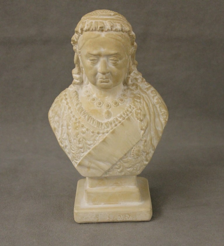 WHITE PLASTER BUST OF QUEEN VICTORIA ISSUED TO COMMEMORATE THE 60TH YEAR OF HER REIGN (DIAMOND: WHITE PLASTER BUST OF QUEEN VICTORIA ISSUED TO COMMEMORATE THE 60TH YEAR OF HER REIGN (DIAMOND JUBILEE). - H: 8 in. W: 4 1/2 in.