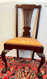 SET 14 CHIPPENDALE STYLE CARVED MAHOGANY DINING CHAIRS. late 19th-early 20th century.: SET 14 CHIPPENDALE STYLE CARVED MAHOGANY DINING CHAIRS. late 19th-early 20th century. Including twelve side chairs and pair taller open-arm chairs. Pierced, flaring splats; slip seats covered in brown