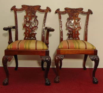 SET 12 CHIPPENDALE-STYLE CARVED MAHOGANY DINING CHAIRS WITH STRIPED UPHOLSTERED SLIP SEATS.: SET 12 CHIPPENDALE-STYLE CARVED MAHOGANY DINING CHAIRS WITH STRIPED UPHOLSTERED SLIP SEATS.  Including pair open-armchairs and ten sidechairs, Ornately carved with pierced vasiform splats; crest have