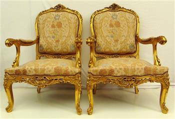 FIVE-PIECE LOUIS XV-STYLE CARVED AND GILT-WOOD SALON SUITE. - Canape, W: 68 in.: FIVE-PIECE LOUIS XV-STYLE CARVED AND GILT-WOOD SALON SUITE.  Including six-leg canape with serpentine seat outline, and four fauteuils. Floral tapestry type brocade upholstered back panels, seats and