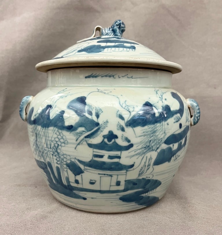 CHINESE UNDERGLAZE BLUE DECORATED PORCELAIN LIFT-COVER APPLE-FORM POT. Landscape decoration; cover: CHINESE UNDERGLAZE BLUE DECORATED PORCELAIN LIFT-COVER APPLE-FORM POT. Landscape decoration; cover has fu dog finial - H: 8 1/4 in.