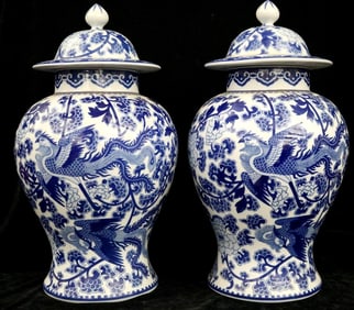 PAIR CHINESE BLUE AND WHITE PORCELAIN LIDDED VASES. - Height: 20 inches (including lid).