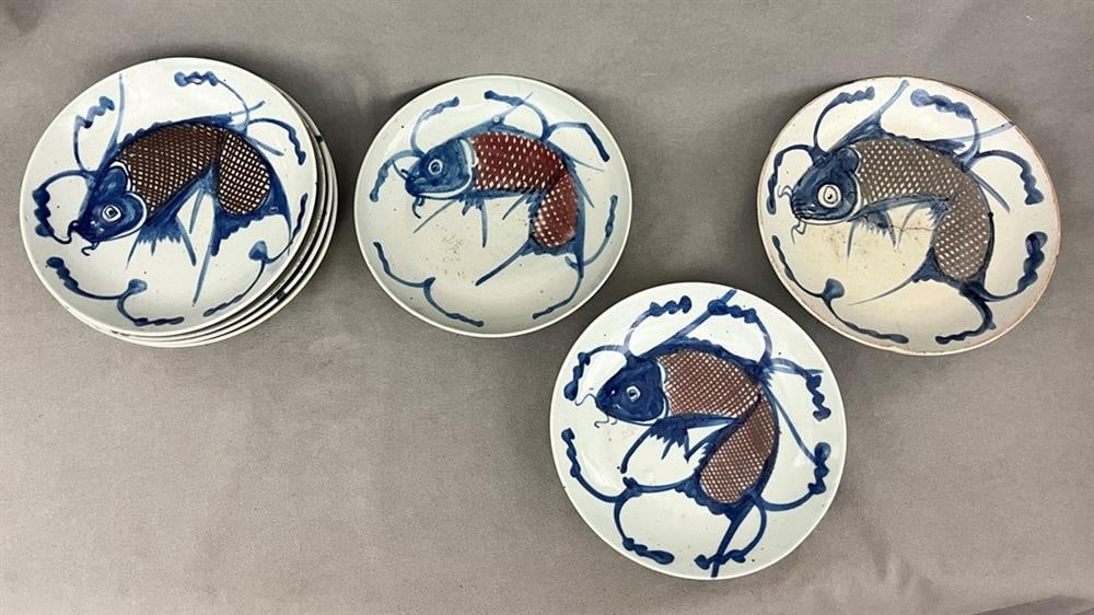 SEVEN CHINESE PORCELAIN PLATES PAINTED IN BLUE AND RUST COLOR WITH FISH MOTIF,: SEVEN CHINESE PORCELAIN PLATES PAINTED IN BLUE AND RUST COLOR WITH FISH MOTIF. Four, D: 8 5/8 in.; three, D: 9 1/4 in.