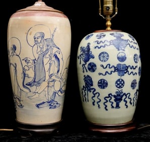 TWO SIMILAR CHINESE POLYCHROME DECORATED PORCELAIN CYLINDRICAL VASES MOUNTED AS TABLE LAMPS. One,