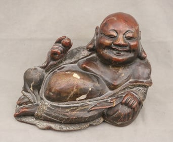CHINESE CARVED AND LACQUERED FIGURE OF RECLINING HOTEI, - H: 12 in.; L: 16 in.