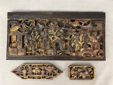 THREE CHINESE CARVED AND GILT DECORATIVE PANELS,
