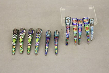 COLLECTION ELEVEN CHINESE MULTI-COLOR ENAMEL DECORATED SILVER FINGERNAIL PROTECTORS. early 20th