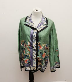 CHINESE MULTICOLOR FLORAL EMBROIDERED GREEN SILK JACKET, early 20th century.