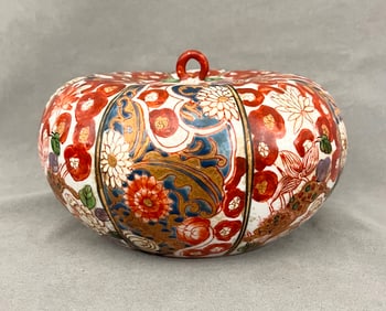 JAPANESE POLYCHROMED PUMPKIN-FORM VASE WITH LIFT COVER, - H: 5 1/2 in. D: 9 1/4 in.