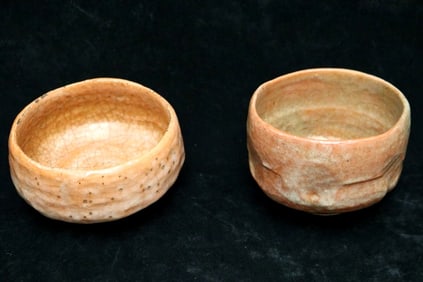 TWO JAPANESE RAKU WARE TEA CEREMONY OR CHAWAN POTTERY BOWLS. - H: app. 3 1/2 in.