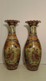 PAIR JAPANESE POLYCHROMED PORCELAIN PALACE VASES, - H: 45 1/4".