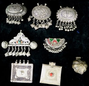 CENTRAL ASIAN TRIBAL PENDANTS,