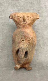 PRE-COLUMBIAN POTTERY VESSEL MODELED AS STYLIZED FIGURE. - H: 9 1/2".