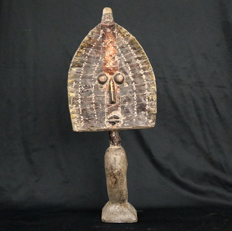 GABONESE KOTA RELIQUARY GUARDIAN "BWETE" FIGURE, - Height: approximately 19 inches.: GABONESE KOTA RELIQUARY GUARDIAN "BWETE" FIGURE. Kota reliquary guardian figure originating from the tribes of Gabon and the Republic of Congo in Central Africa. These figures, also known as "bwete" o