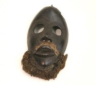 IVORY COAST WOODEN DAN CARVED MASK. Mid-20th Century. - Height: 9.5".